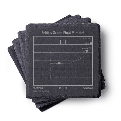 Stack of NQLD Cowboys NRL slate coasters with engraved playbook sports design and text on a white background